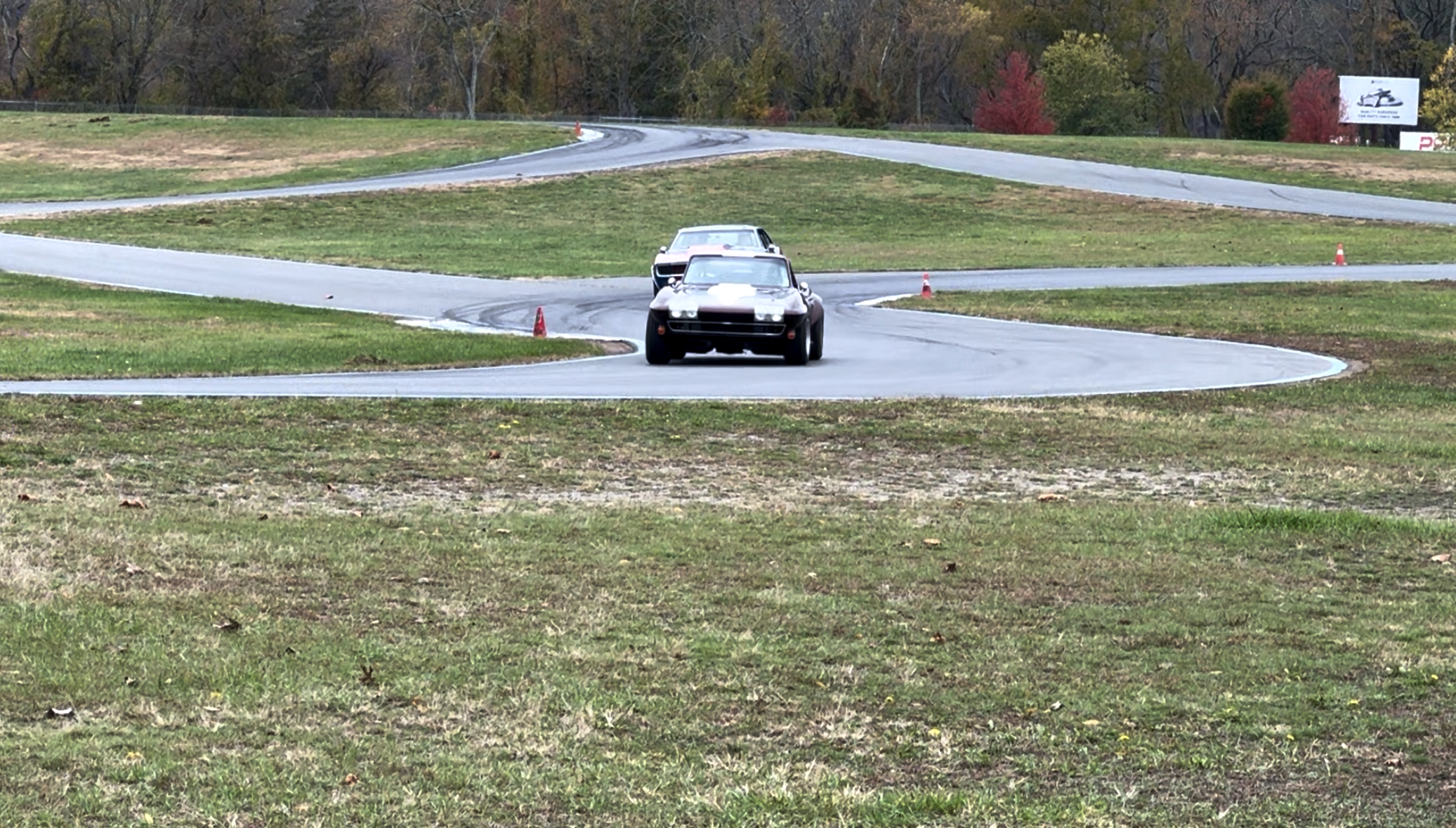 Turn 3 overlay showing ideal vs current line with speed and lateral-G traces.